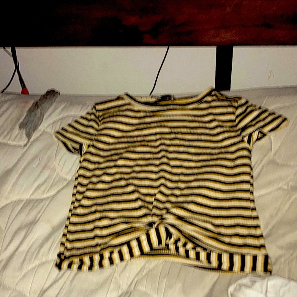 I bought this shirt and it doesn’t fit me so I hope it fits someone nice!